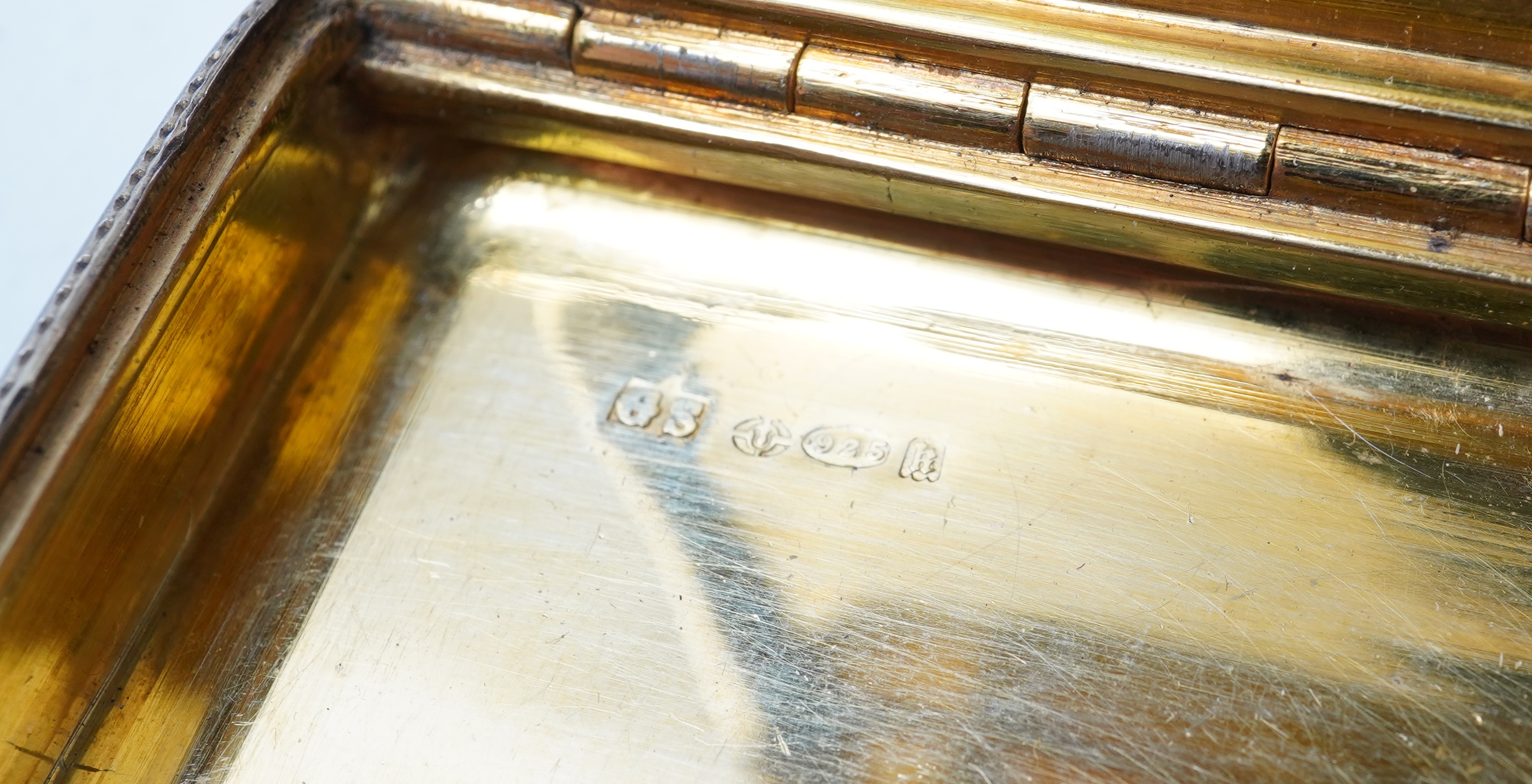 A collection of jewels including an Art Deco silver cigarette case